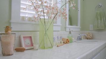 Interior of beach home bathroom sink with coastal decor video