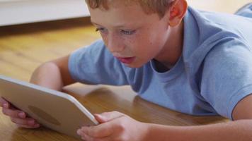 Closeup of young boy using digital tablet. Shot on RED EPIC for high quality 4K, UHD, Ultra HD resolution. video