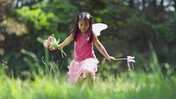 Girl in fairy princess costume running in grass, shot on Phantom Flex 4K video