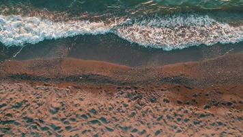 Bird's Eye View of Ocean Waves Crashing on the Sand video
