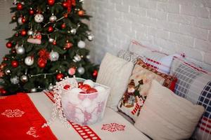 Beautiful Christmas festive interior in a country house on Christmas Eve photo