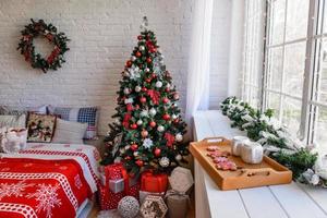 Beautiful Christmas festive interior in a country house on Christmas Eve photo