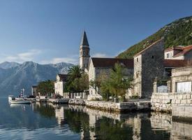 perast traditional balkan village mountain landscape near kotor in montenegro photo