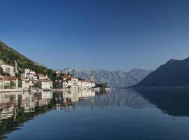 perast traditional balkan village mountain landscape near kotor in montenegro photo