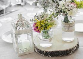 flowers arrangement and decoration rustic interior design in wedding table photo
