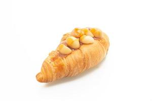 croissant with macadamia and caramel photo