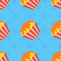Colorful seamless pattern of appetizing cupcakes on a blue background. Simple flat vector illustration. For the design of paper wallpapers, fabric, wrapping paper, covers