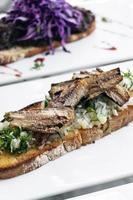 Portuguese tiborna open toast sandwich tapas with sardine and onion garlic