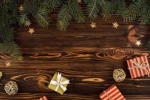 Christmas composition. Christmas gifts on wooden background