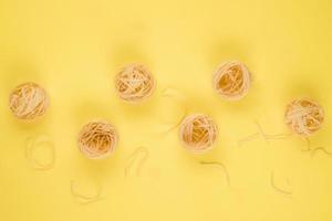 Pasta. Top view.On the yellow background. photo