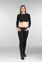 Full length photo of  sexy woman in the black casual clothes. - Image