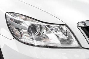 Modern car headlight, car exterior detail photo