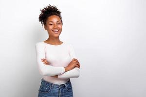 Happy girl folded her hands standing in studio. Concept gesture - Image photo