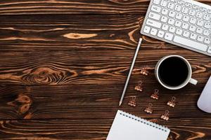 Top view office wooden  desk. - Copyspace photo