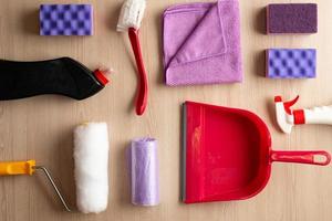 household accessories neatly laid out on the table. Top view photo