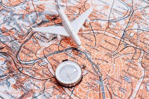 Reliability and confidence during travel. Magnetic compass on a topographic map. photo