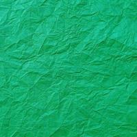 Fondo de textura de papel verde arrugado realista vector