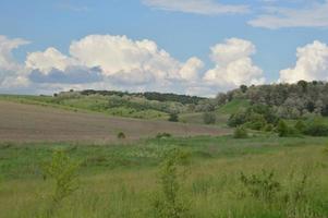 A plowed field in the hills photo