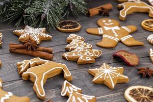 Homemade christmas gingerbread cookies on wooden table. photo