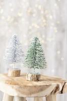 Christmas tree on bohek wooden, bokeh background. photo