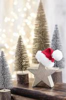 Christmas tree on bohek wooden, bokeh background. photo