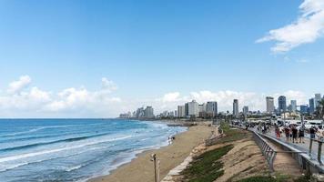 Seascape and skyscrapers on background in Tel Aviv, Israel. photo