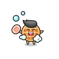 circle waffle character is bathing while holding soap vector