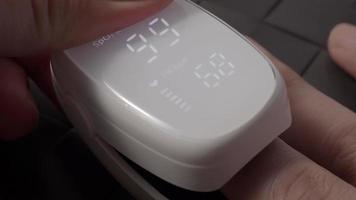 Finger pulse oximeter used to measure pulse rate and oxygen video