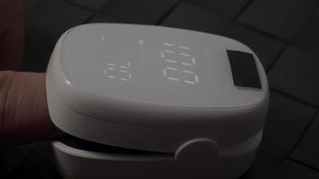 Finger pulse oximeter used to measure pulse rate and oxygen video