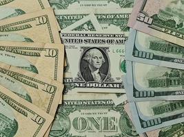 Background for economy and finance themes with american dollar money photo