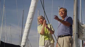 Senior couple on sailboat together. Shot on RED EPIC for high quality 4K, UHD, Ultra HD resolution. video