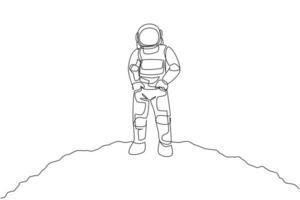 One continuous line drawing of young spaceman on spacesuit put hands in pockets in moon surface. Astronaut business office with deep space concept. Dynamic single line draw design vector illustration