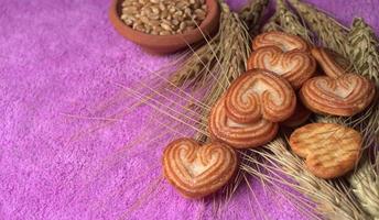 Sweet biscuits in shape of hearts. photo