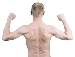 Man standing with his back against a white background photo