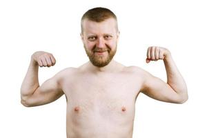 Funny bearded man shows his biceps photo