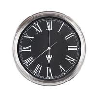 Six o'clock on the round clock photo