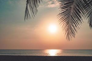 Tropical nature clean beach sunset sky time with sun light. photo