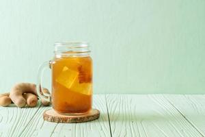 Delicious sweet drink tamarind juice and ice cube photo