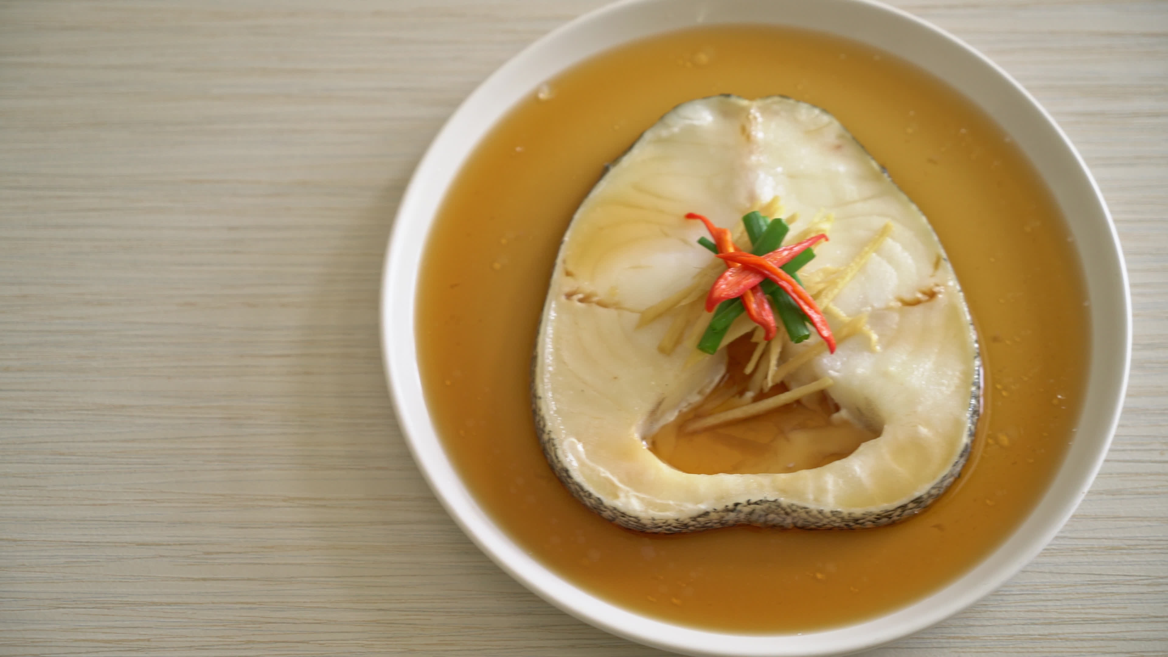 steamed cod fish with soy sauce 3524262 Stock Video at Vecteezy