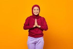 Portrait of beautiful asian woman smiling friendly greeting customers photo