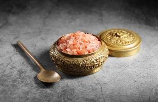 Himalayan pink salt in golden box at loft kitchen photo