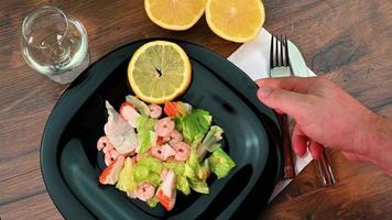 serve a plate of fish salad video