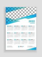 Diseño de calendario de pared de una página 2022. Diseño de calendario de pared 2022. Diseño de calendario de año nuevo 2022. La semana comienza el lunes. plantilla para calendario anual 2022 vector