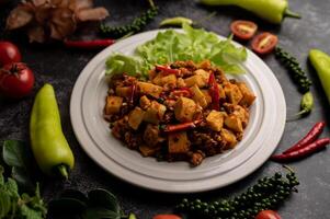 Stir Fried Curry Paste with Bamboo Shoot and Minced Pork. photo