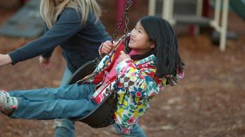 Girl spinning on swing in slow motion shot on Phantom Flex 4K at 500 fps video