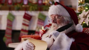 Closeup, Santa Claus writing on list video