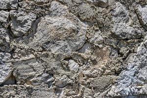 Texture of a stone wall in Mexico photo