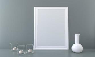 A blank picture frame with a vase and candles on a table