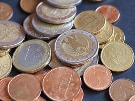 Euro coins, European Union over black photo