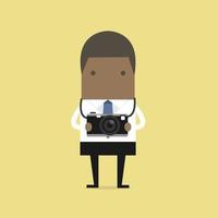 African businessman holding a camera. vector